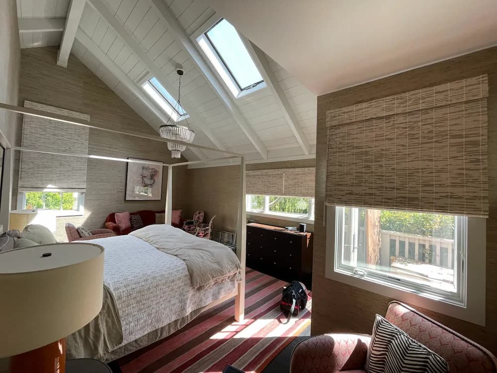 Professionally installed roller shade in a bedroom
