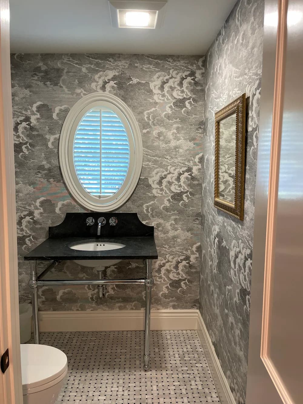 Custom drapery installation in a living room